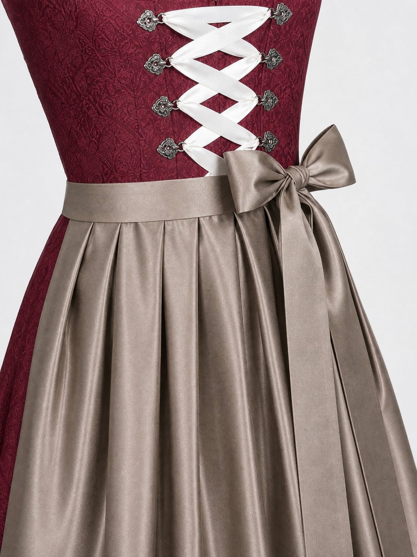 Dirndl Juliana in Weinrot mit Taupe Schürze - Detailansicht Taille und Schleife