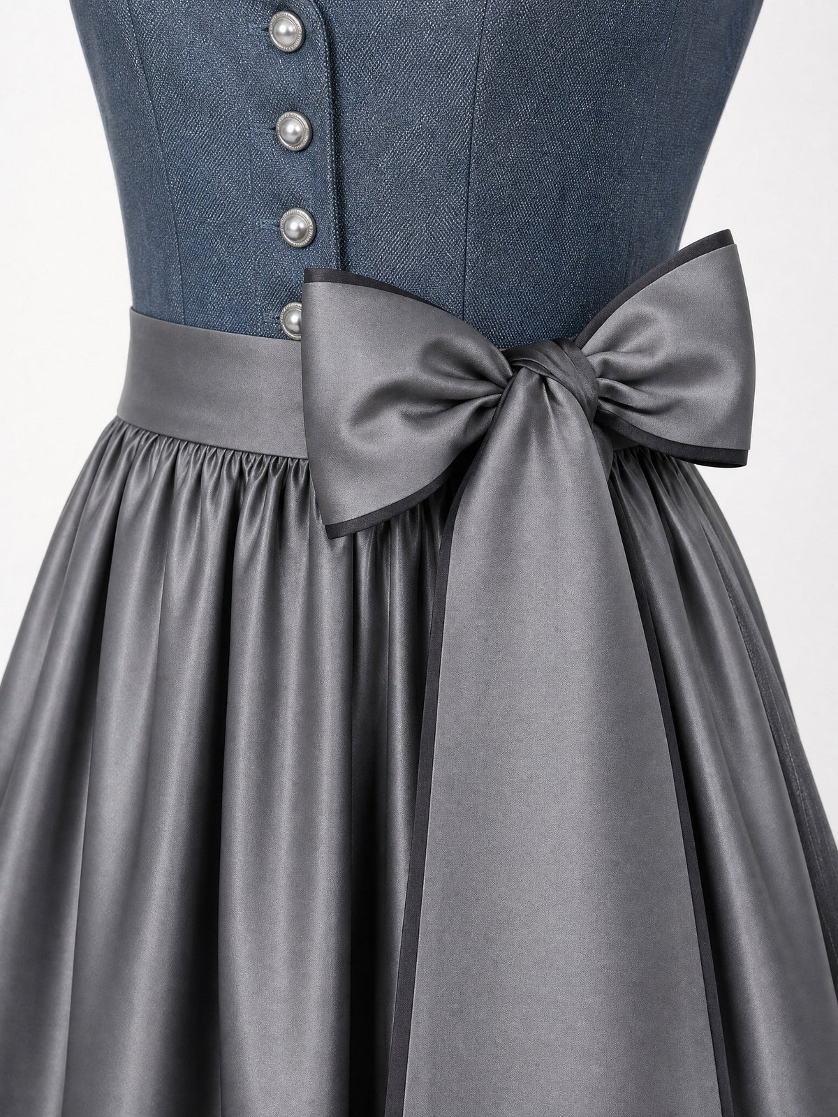 Dirndl Bella in Stahlblau mit Sturmgrau Schürze - Detailansicht Taille und Schleife
