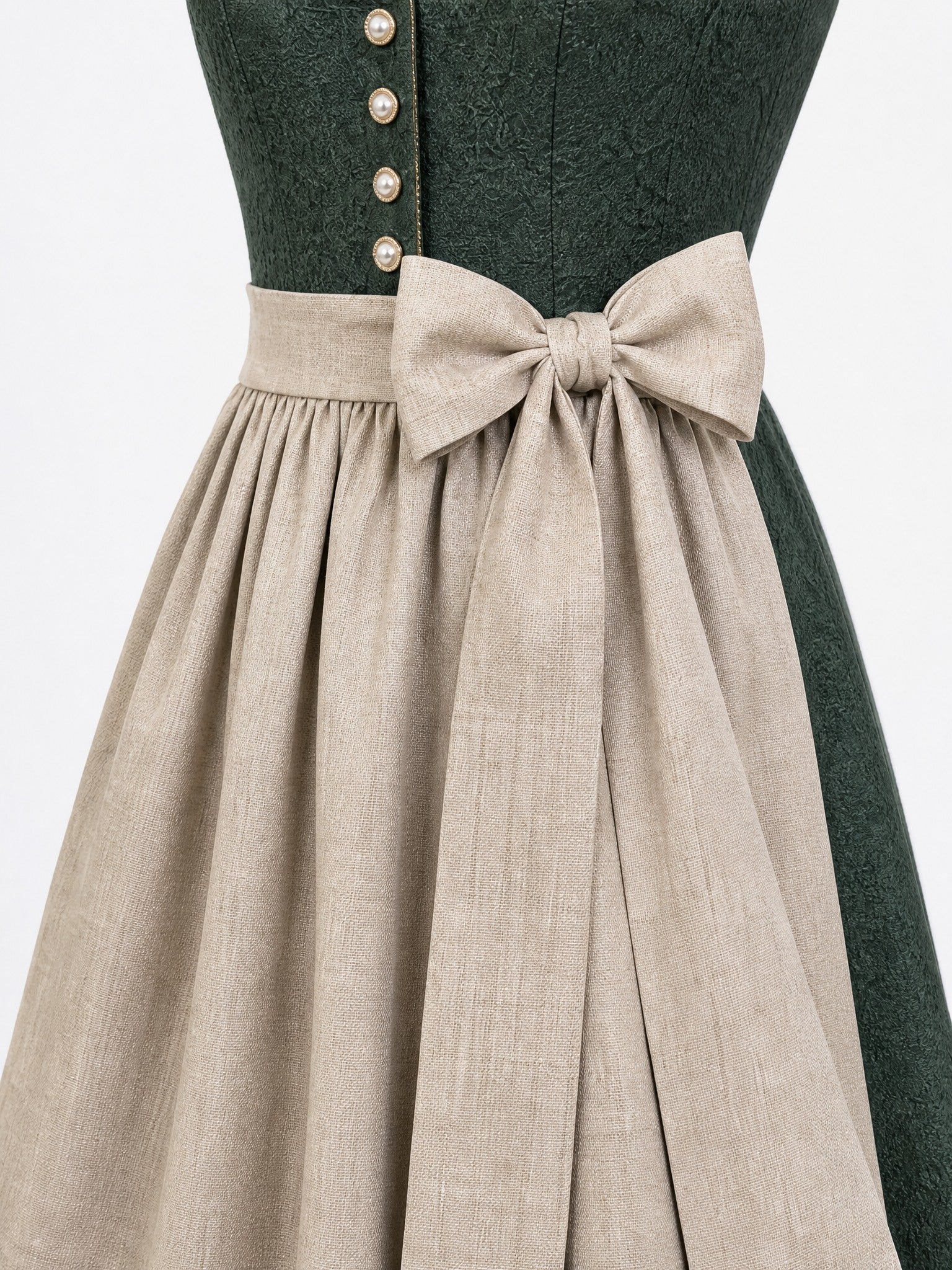 Dirndl Anika in Waldgrün mit Haferbeige Schürze - Detailansicht Taille und Schleife