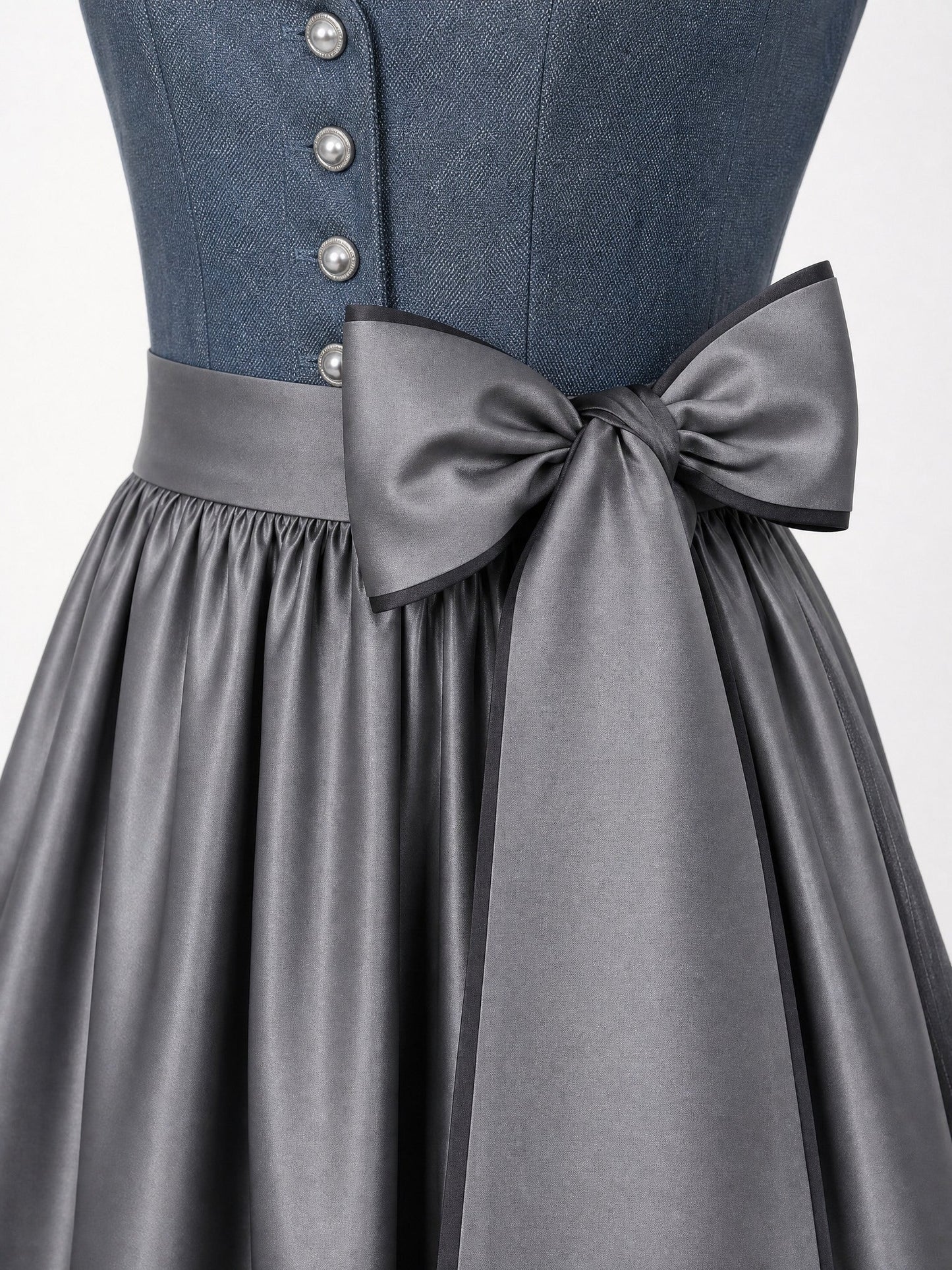 Dirndl Bella in Stahlblau mit Sturmgrau Schürze - Detailansicht Taille und Schleife